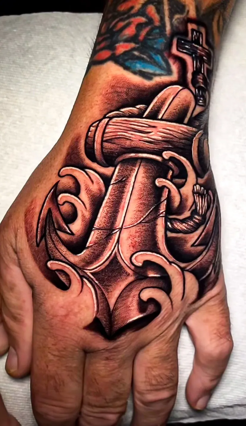 black and grey dagger hand piece tattoo by Steve Bachman, Long Beach