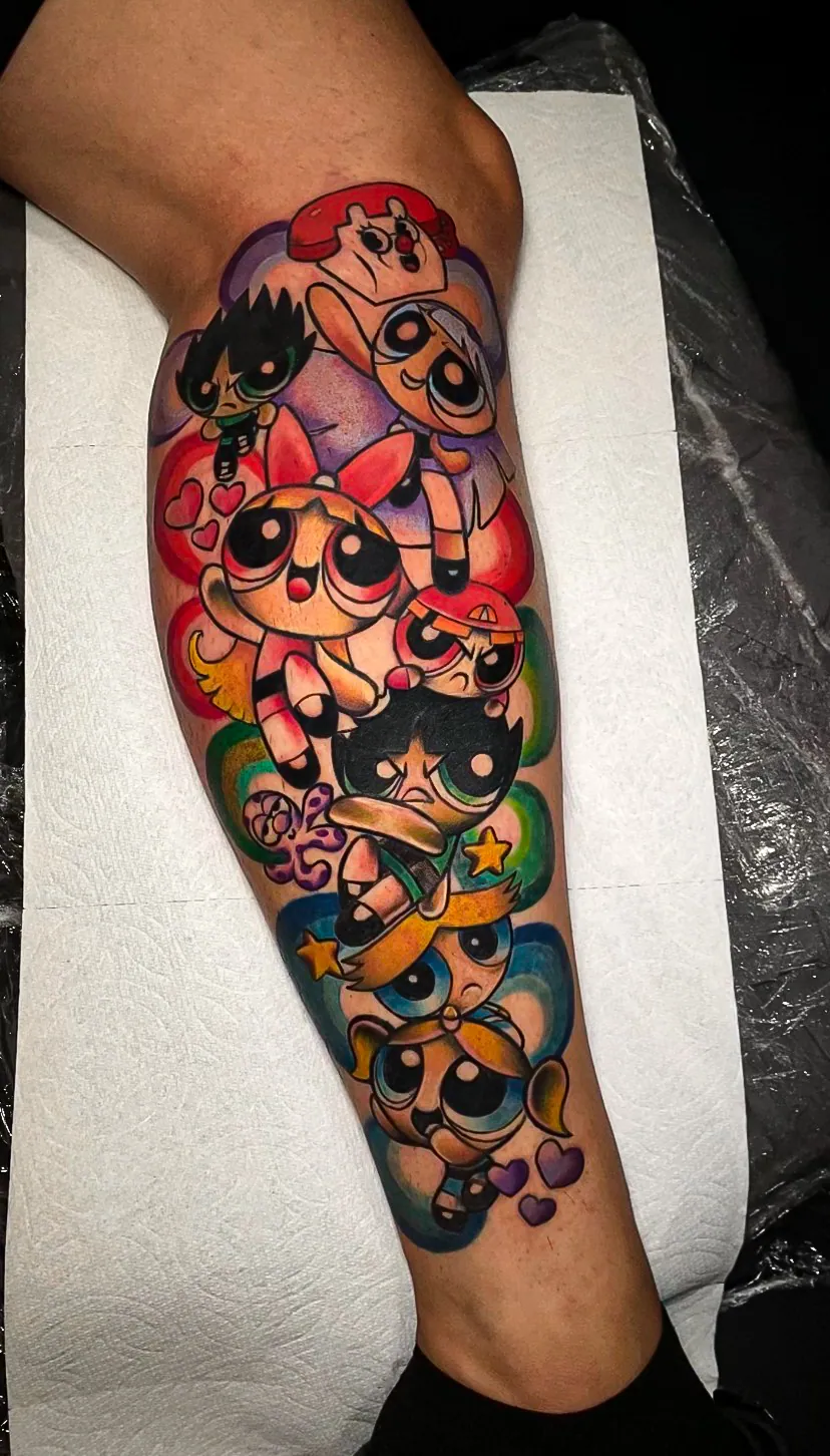 color illustrative cartoon characters leg piece tattoo by Steve Bachman, Long Beach