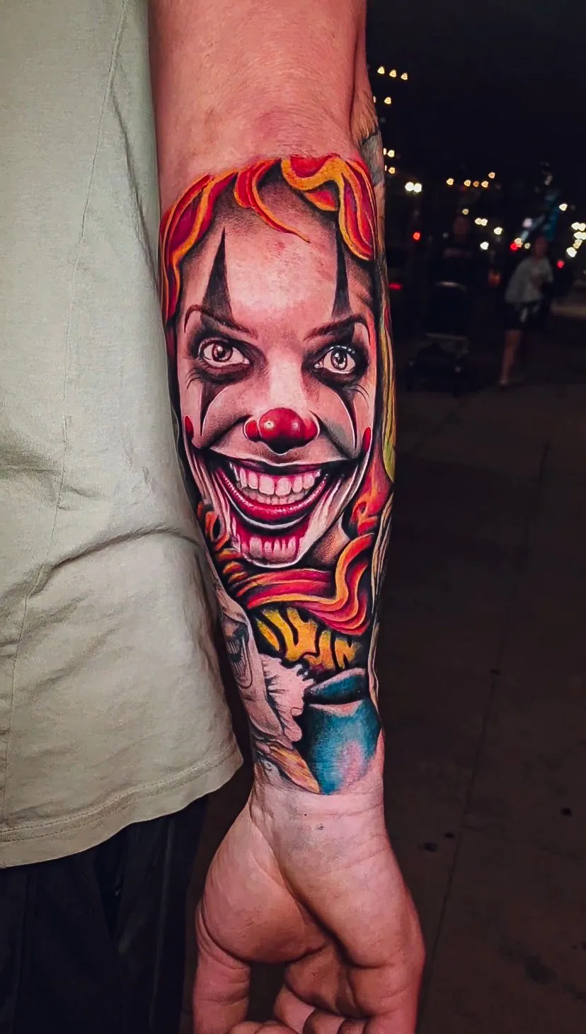 color realism Pennywise forearm tattoo by Steve Bachman, Long Beach